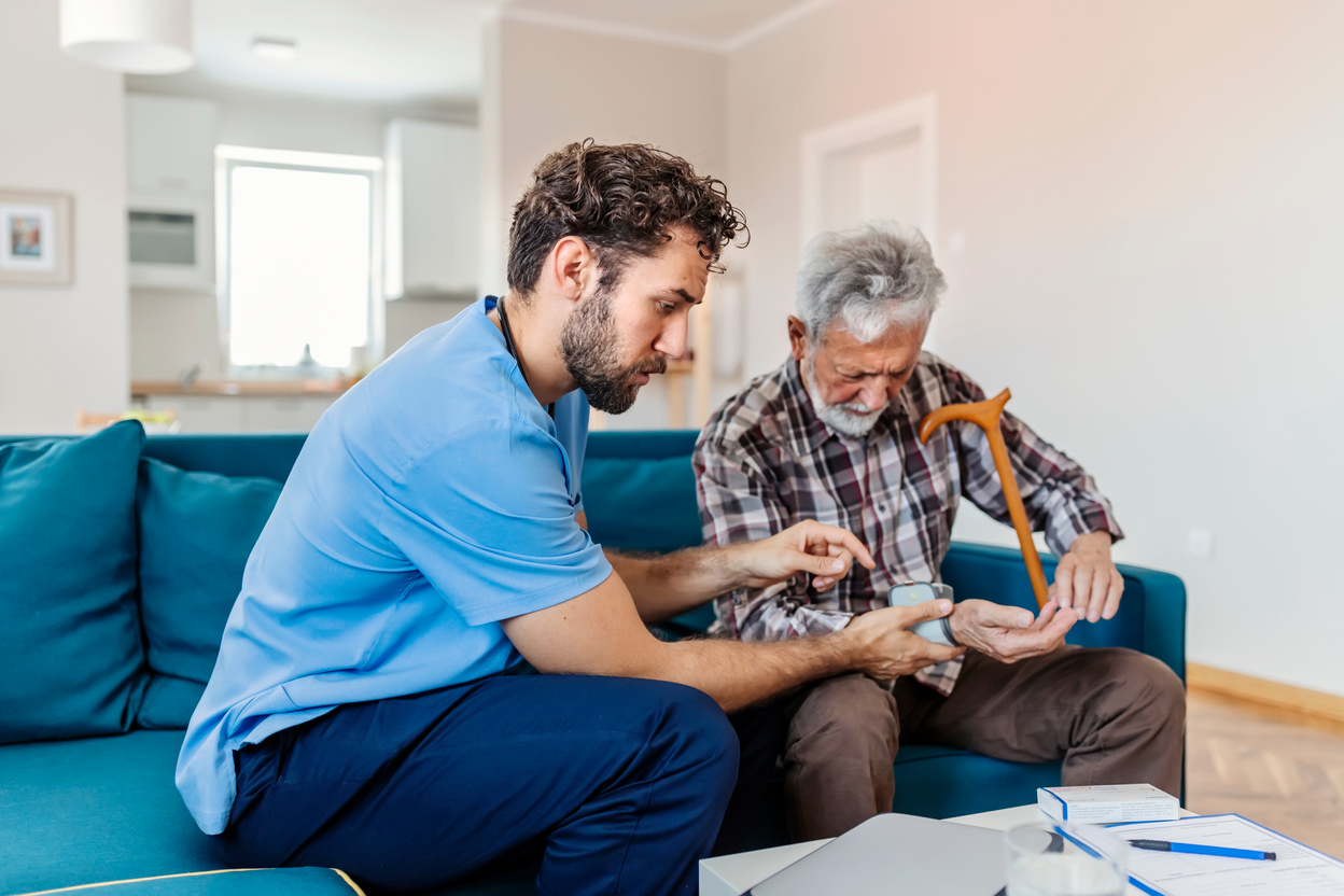 Blood Pressure Checking by Male Caregiver