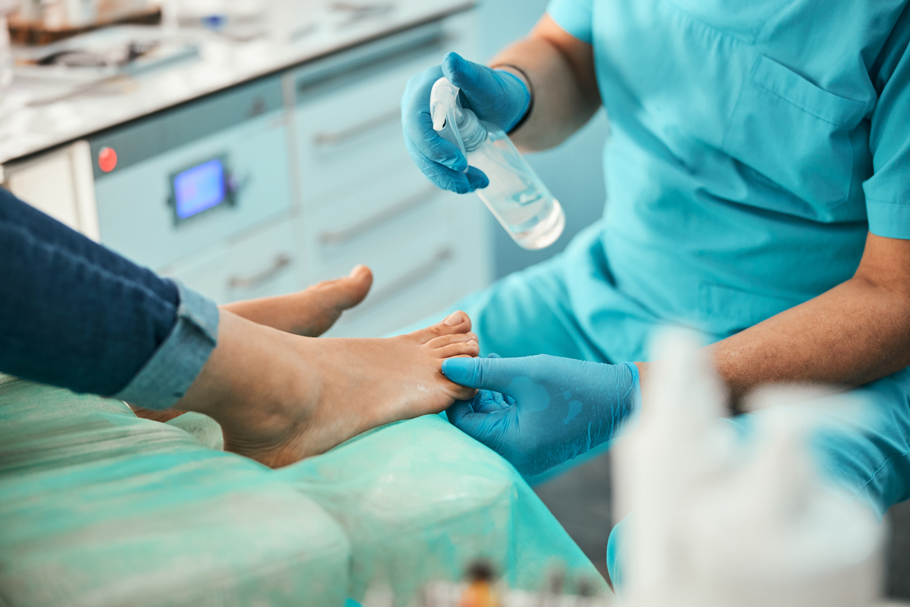 Close up of podiatrist preparing nails for procedure